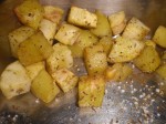 Bag kartofler og pastinakker i ovnen.