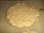 Form kartoffelmassen til små pandekager.